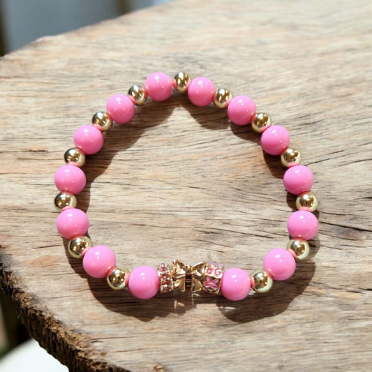 Pink And Gold With A Golden Bow Charm Bracelet